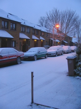 fresh snow on the street at dawn